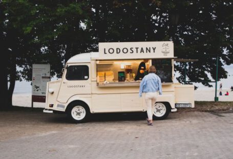 Upgrade Vs. Buying - A woman standing in front of a food truck