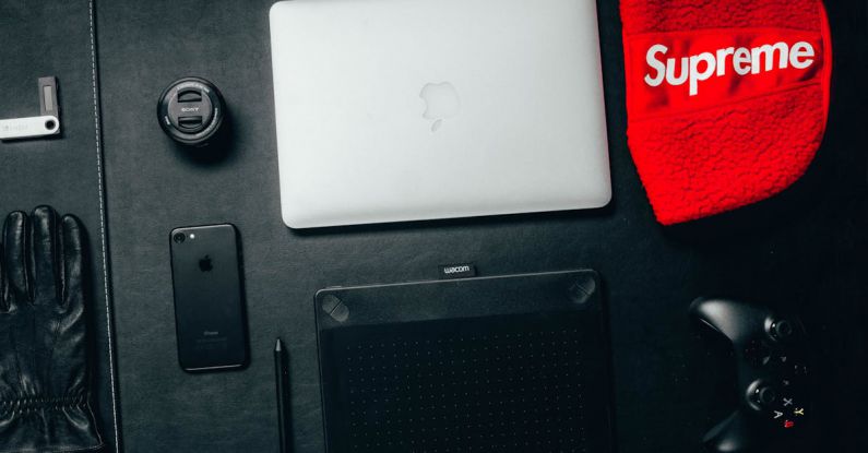 Desk Setup - Macbook Beside Red Supreme Textile