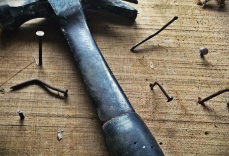 DIY Repair - Black Claw Hammer on Brown Wooden Plank
